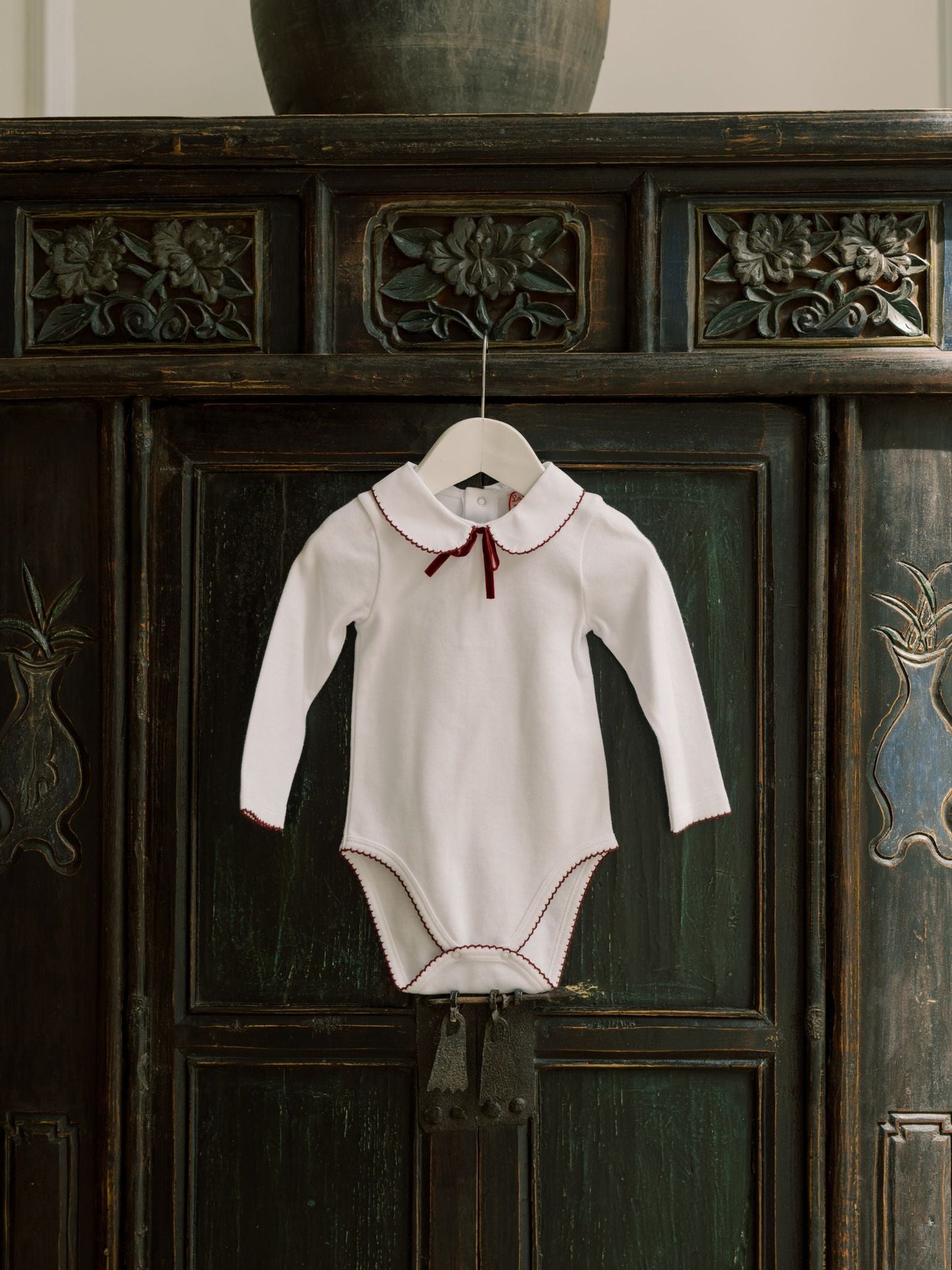 White Lirio Baby Bodysuit